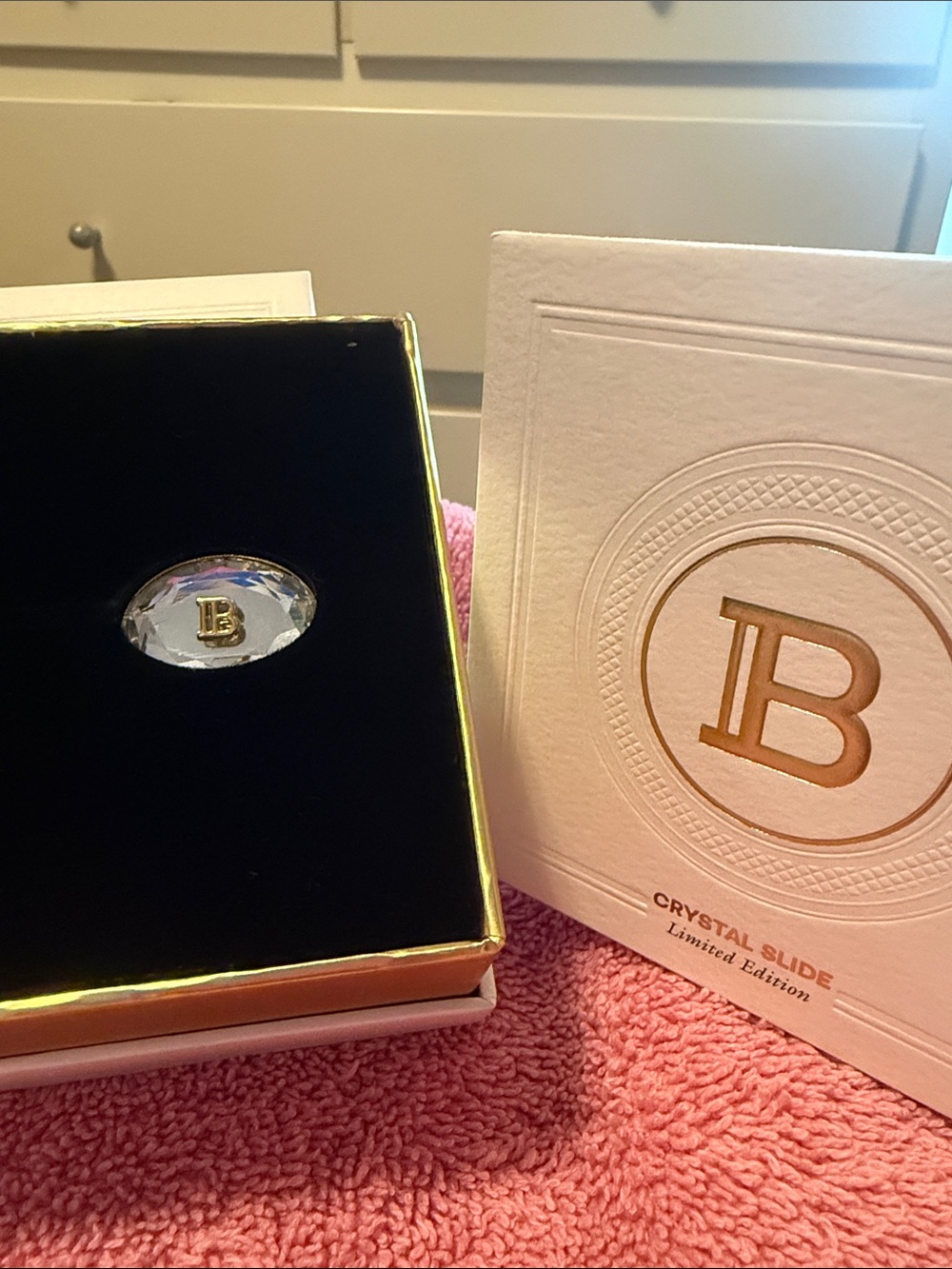 A Pair of Balmain Crystal Slide with Gold 'B' Emblem - Limited Edition